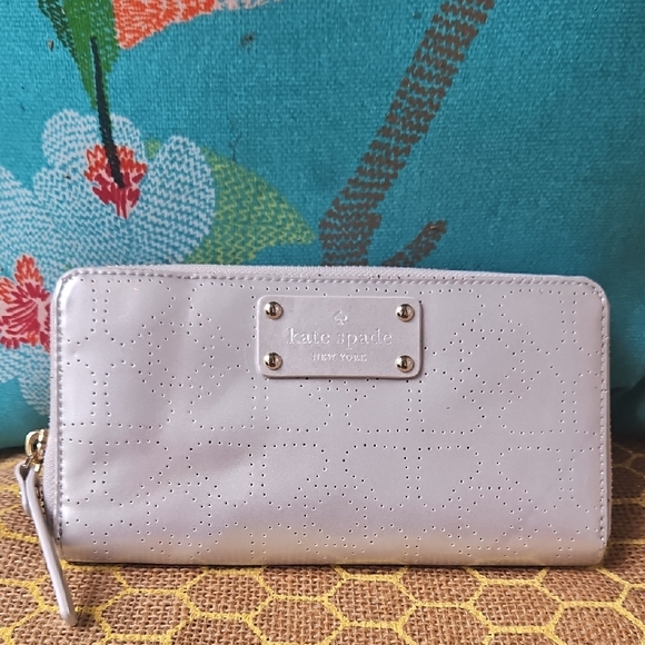 kate spade Handbags - Kate Spade Neda Metallic Silver Perforated Wallet